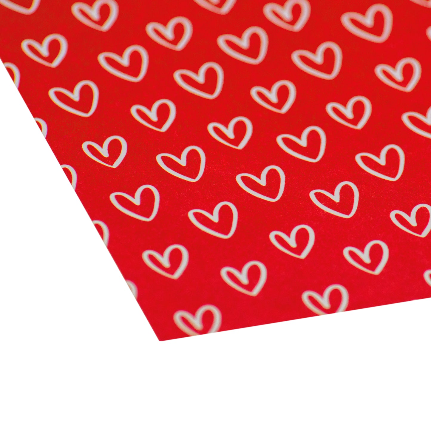 Nahaufnahme der Vorderseite: Liebevoll gestaltetes rotes Designerpapier mit zahlreichen weißen Herzen – perfekt für kreative Handarbeitsprojekte von Stanzi.