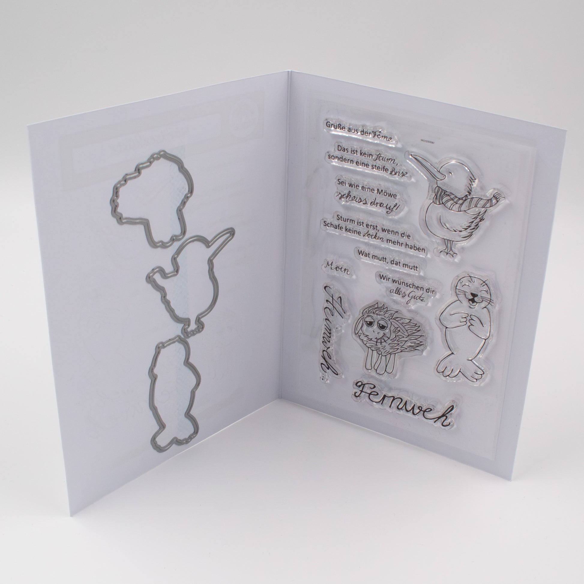 Geöffnetes Stanzi® Bastelset in der Einstiegsversion mit Clear Stamps und Stanzschablonen